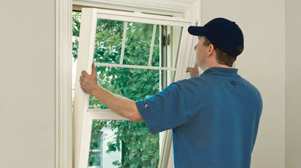 Professional contractors performing a residential window insulation and replacement service in Reno, NV